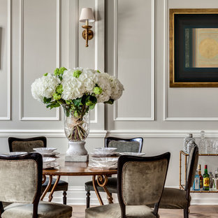 Diseño de comedor tradicional con paredes beige