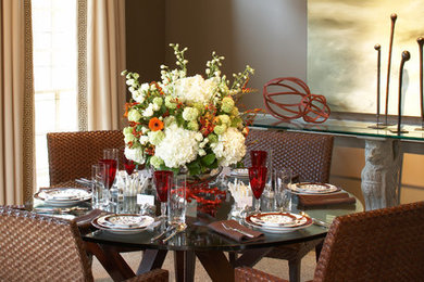 Dining room - transitional carpeted dining room idea in Atlanta with brown walls