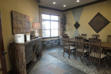 Example of an urban dining room design in Houston