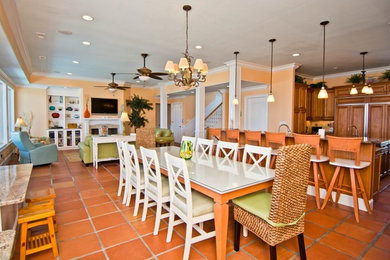 Example of a beach style dining room design in Other
