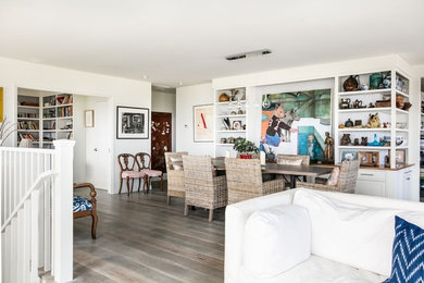 Great room - large coastal light wood floor great room idea in Los Angeles with yellow walls