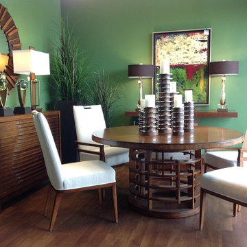 Green dining rm with round table