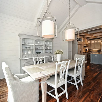 Enclosed dining room - mid-sized country dark wood floor enclosed dining room idea in Charlotte with white walls