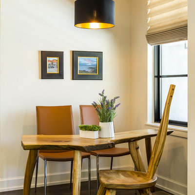 Example of a small transitional dark wood floor and brown floor dining room design in Albuquerque with beige walls