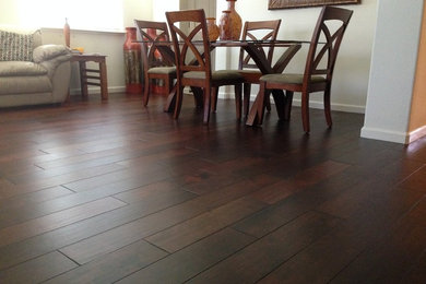 Example of a classic dark wood floor dining room design in Sacramento