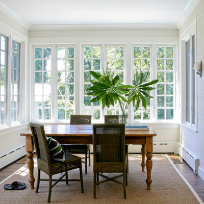 Dining room - traditional dark wood floor dining room idea in New York with white walls