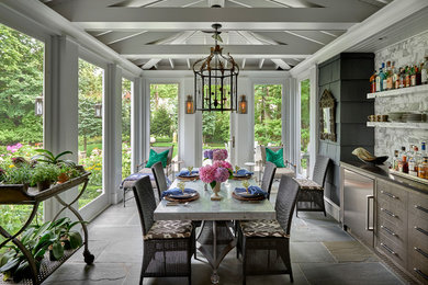 Inspiration for a country enclosed dining room remodel in Chicago with white walls