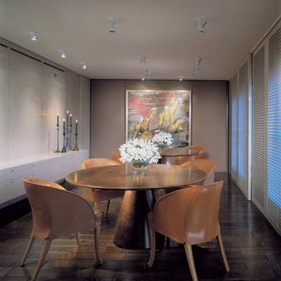 Trendy dark wood floor dining room photo in Chicago with beige walls