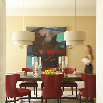 Dining room - transitional dark wood floor dining room idea in Los Angeles with beige walls