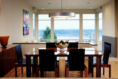Example of a minimalist dining room design in Seattle