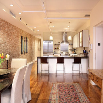 Historic Loft Renovation, Open Dining Area and Kitchen with Exposed Brick, NYC