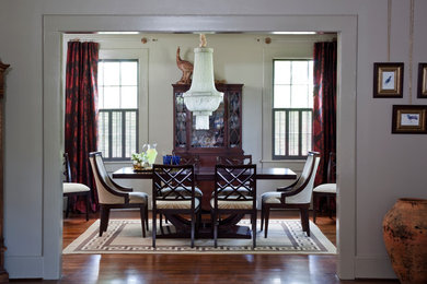 Mid-sized elegant medium tone wood floor kitchen/dining room combo photo in Atlanta with gray walls