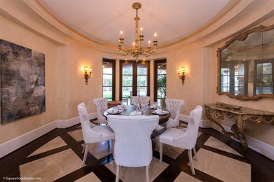 Enclosed dining room - transitional dark wood floor enclosed dining room idea in San Diego with beige walls