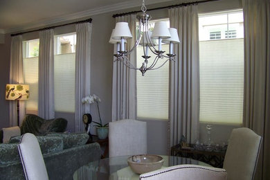 Example of a mid-sized classic great room design in Orange County with gray walls