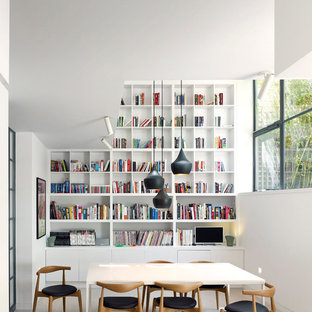 Immagine di una sala da pranzo scandinava con pareti bianche