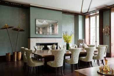 Design ideas for a large modern dining room in London with green walls.