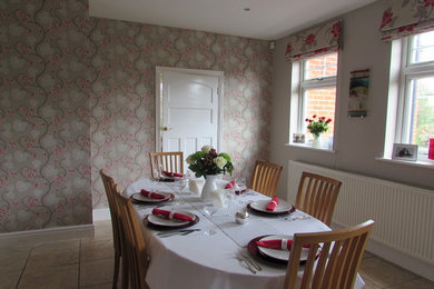 Photo of a medium sized modern kitchen/dining room in Other with multi-coloured walls.