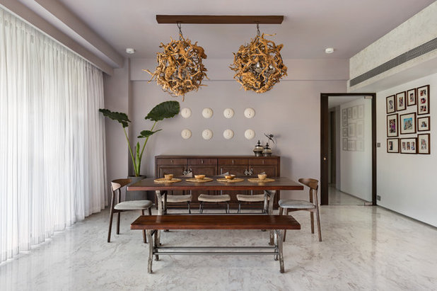 Contemporary Dining Room by amritha karnakar architectural design