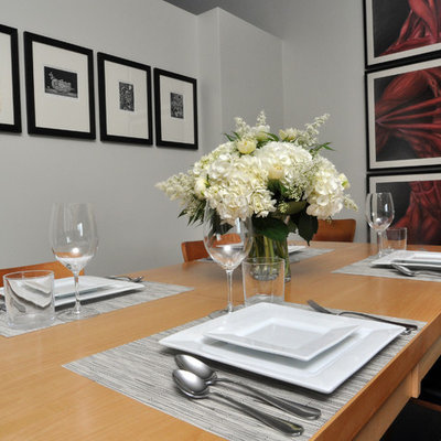 Dining room - contemporary dining room idea in Chicago with gray walls