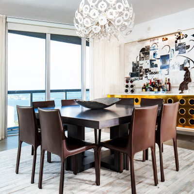 Example of a trendy dining room design in Miami