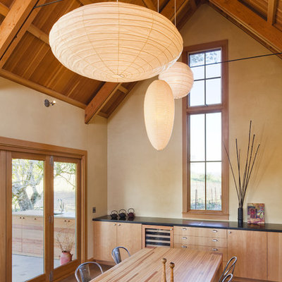 Example of a mid-sized farmhouse kitchen/dining room combo design in San Francisco with beige walls