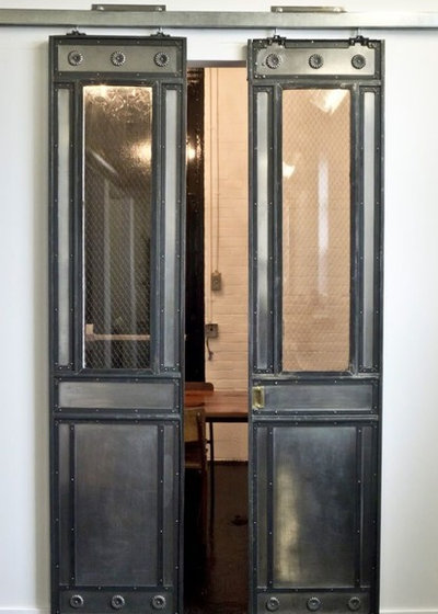 Industriel Salle à Manger by Specialty Doors