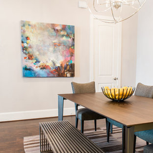 Kitchen/dining room combo - huge industrial dark wood floor kitchen/dining room combo idea in Houston with gray walls, a standard fireplace and a tile fireplace