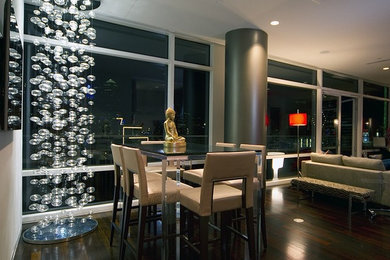 This is an example of a medium sized modern kitchen/dining room in Dallas.