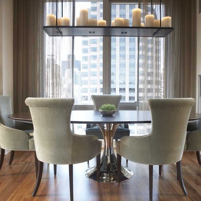 Trendy dark wood floor dining room photo in Boston with gray walls