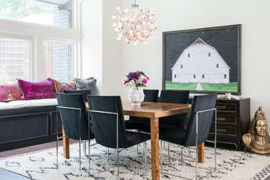 Inspiration for a transitional dining room remodel in Dallas with white walls