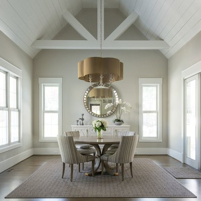 Example of a transitional dark wood floor and brown floor dining room design in Atlanta with beige walls