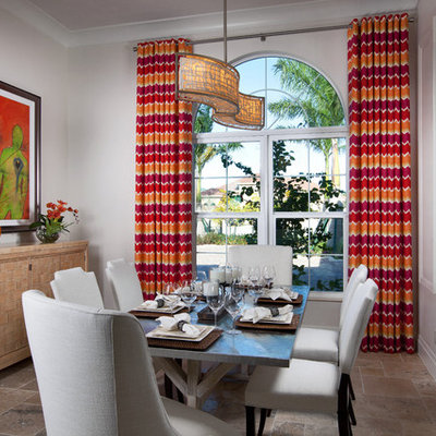 Inspiration for a contemporary dining room remodel in Miami with white walls