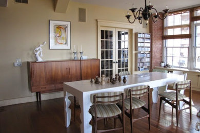 Inspiration for a large craftsman dark wood floor enclosed dining room remodel in Philadelphia with beige walls and no fireplace