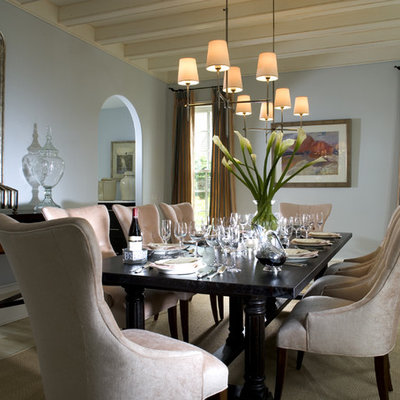 Inspiration for a timeless light wood floor enclosed dining room remodel in Atlanta with blue walls