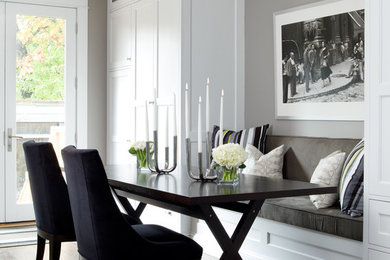 Inspiration for a contemporary dark wood floor dining room remodel in Toronto with gray walls