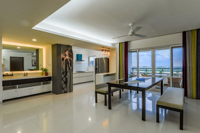 Design ideas for a modern dining room in Hyderabad.