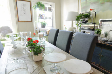 Example of a transitional dining room design in Other