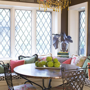 Dining room - traditional dining room idea in St Louis with brown walls