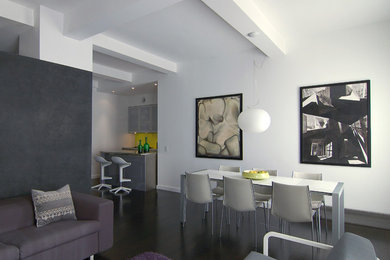 Inspiration for a small modern dining room in New York with white walls, dark hardwood flooring and no fireplace.