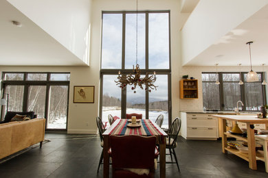 Mountain style dining room photo in Montreal
