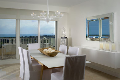 Example of a trendy dining room design in Miami with white walls