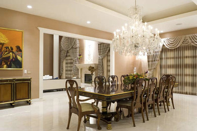 Example of a huge classic marble floor kitchen/dining room combo design in Las Vegas with beige walls