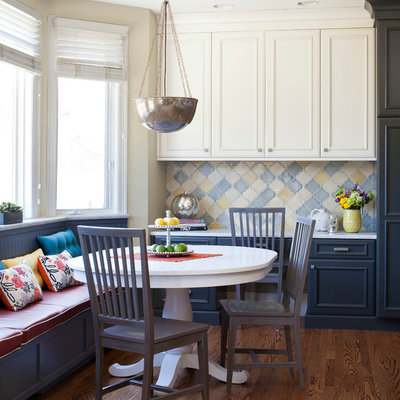 Inspiration for a mid-sized timeless dark wood floor dining room remodel in Denver with white walls
