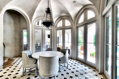 Dining room - contemporary dining room idea in Houston with gray walls