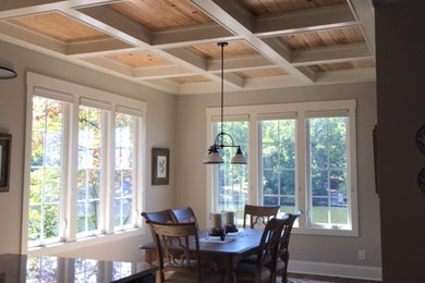 Example of an arts and crafts dining room design in Raleigh