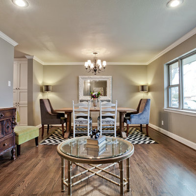 Example of a trendy dark wood floor dining room design in Dallas with beige walls