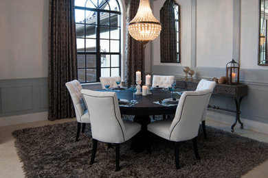 Example of a mid-sized trendy porcelain tile enclosed dining room design in Tampa with multicolored walls and no fireplace