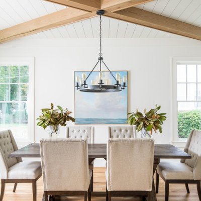 Enclosed dining room - transitional light wood floor and beige floor enclosed dining room idea in Atlanta with white walls and no fireplace