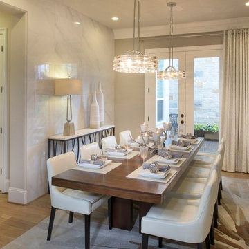 Large Contemporary Dining Room with Two Chandeliers