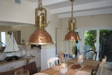 This is an example of a large nautical kitchen/dining room in Miami.